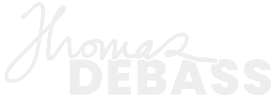 thomas-debass_logo_wht_200px